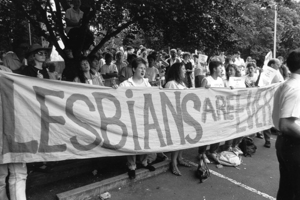 Women marching behind Lesbians are Everywhere banner. Photo: Bryony Nainby